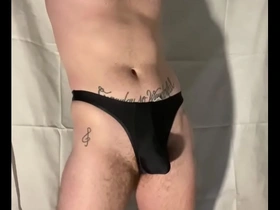 Italian guy in thong shows cock