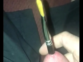 Paint brush in piss hole 4