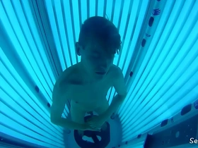 Sexy jock at the tanning booth