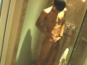 Dark skin asian boy shower